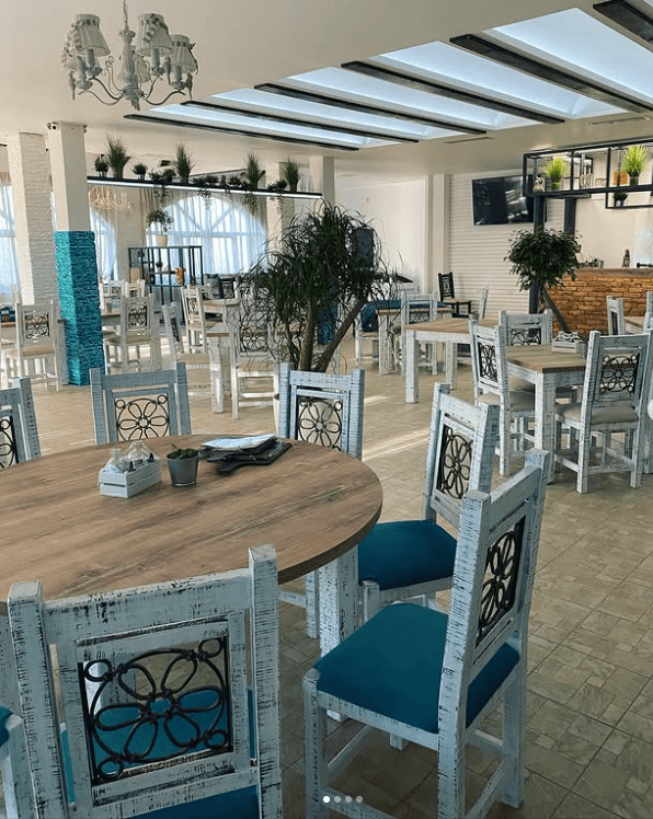 Interior dining room with stone, timber and open beams